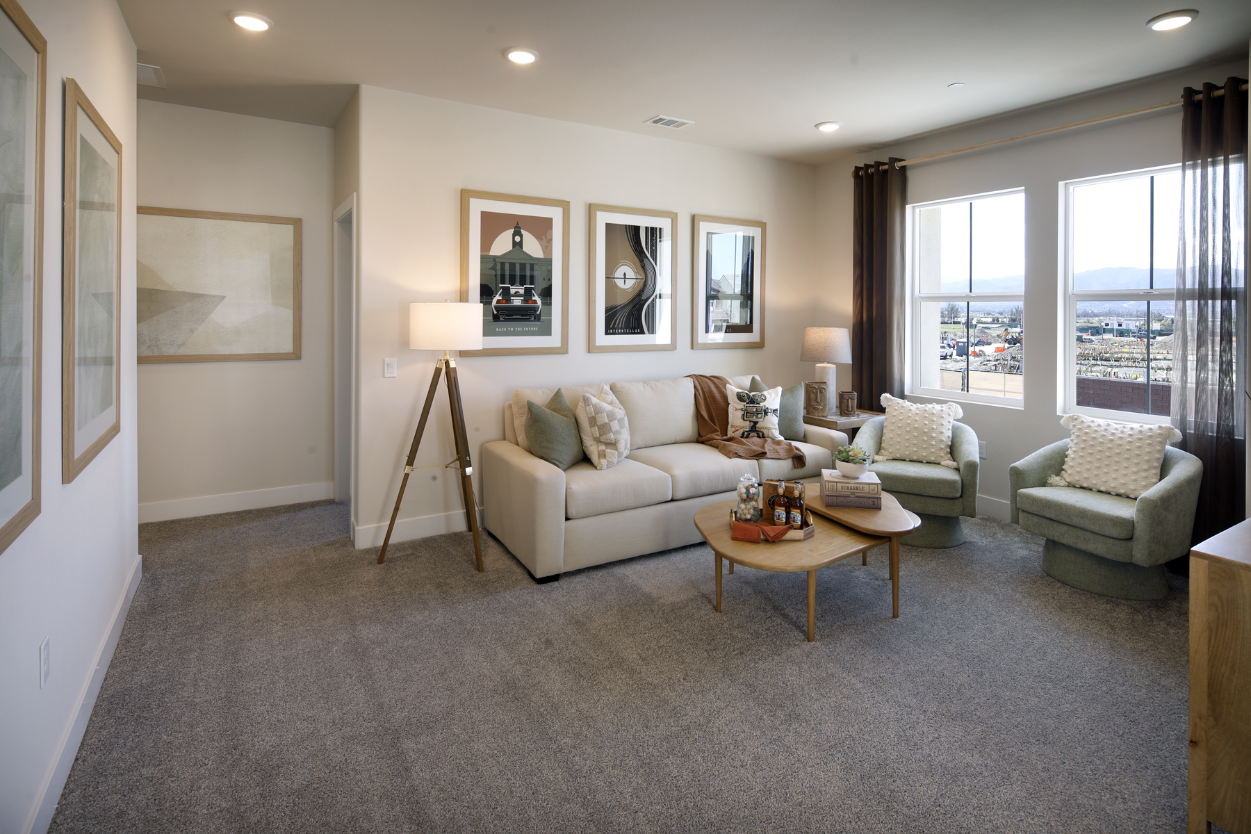 A living room with a large window.