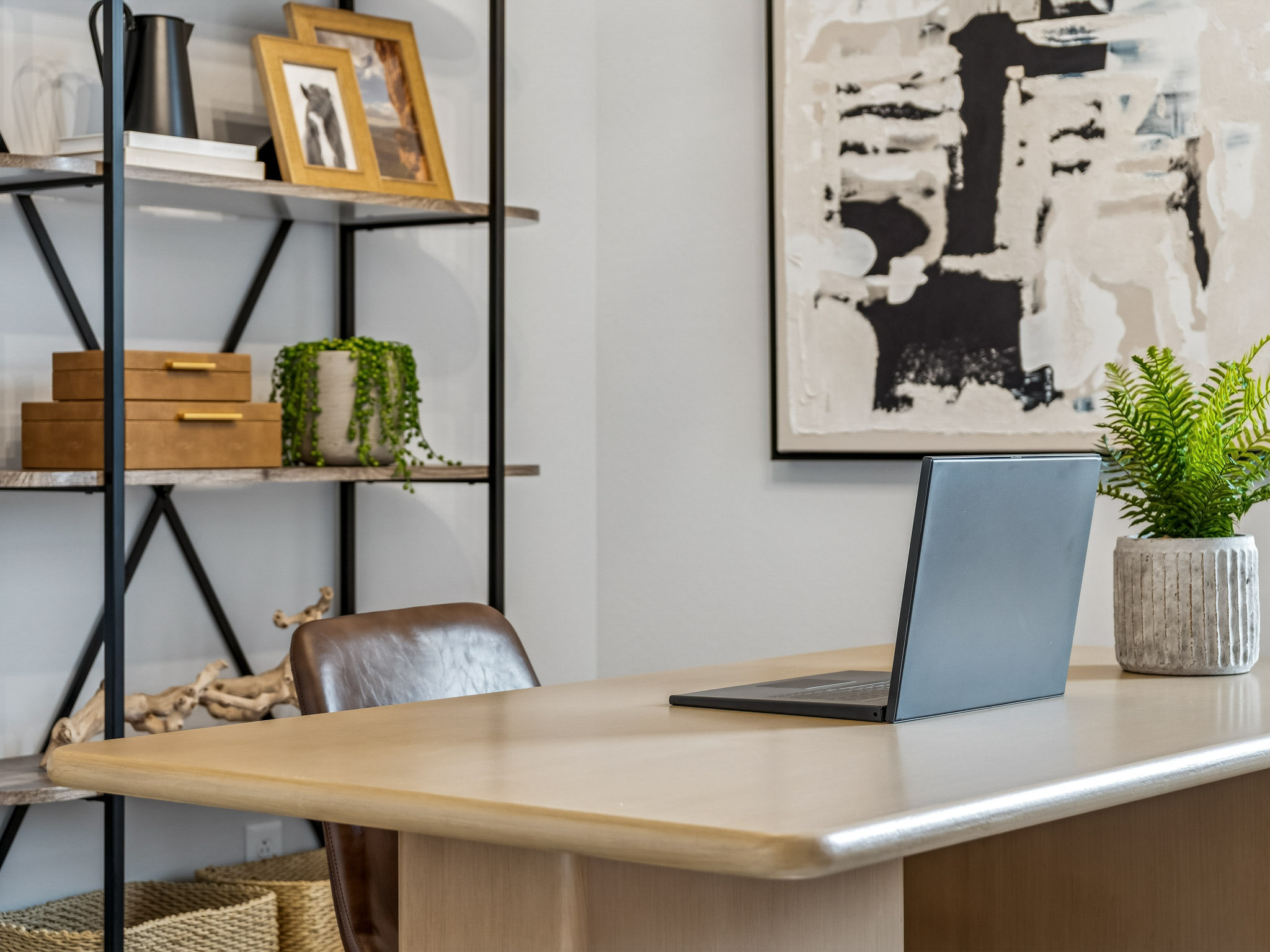 A laptop on a table.