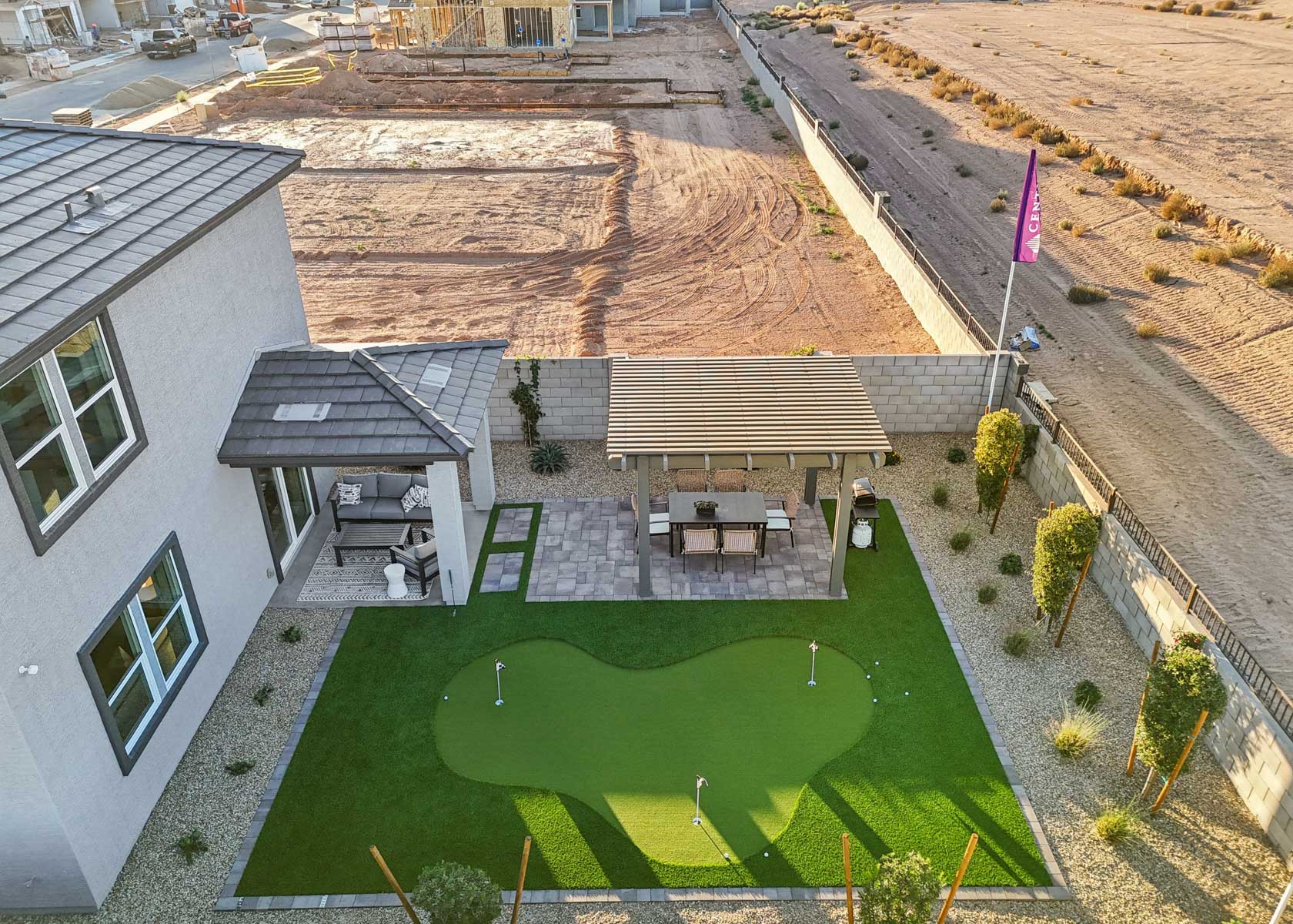 A backyard with a pool.