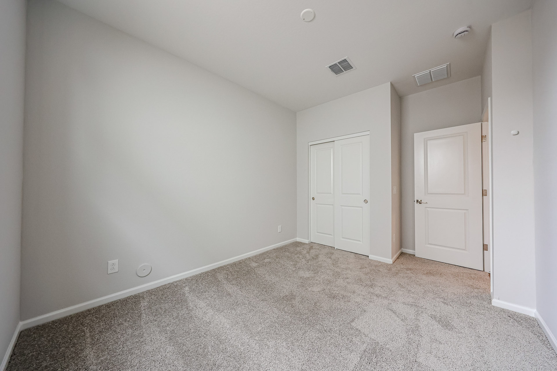 A room with white doors.