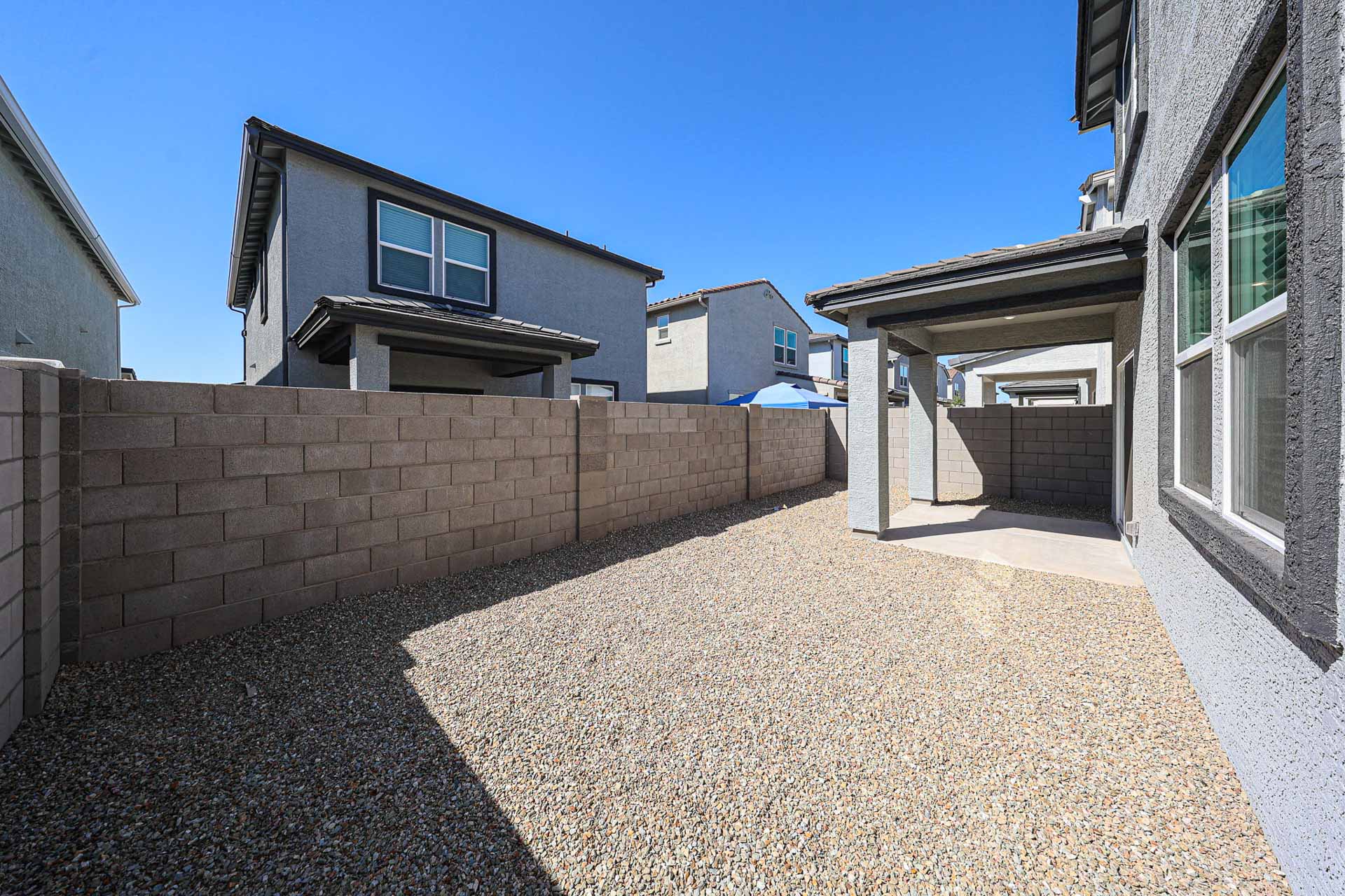 A brick wall and a building.