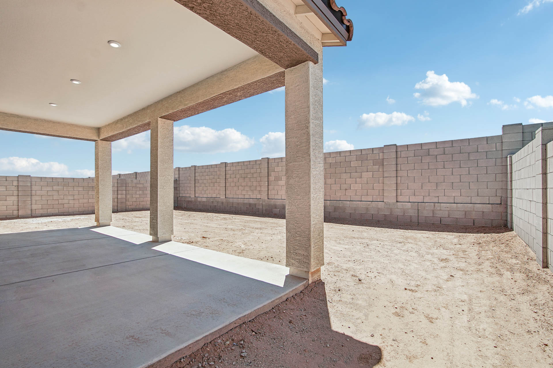 A concrete structure with pillars.
