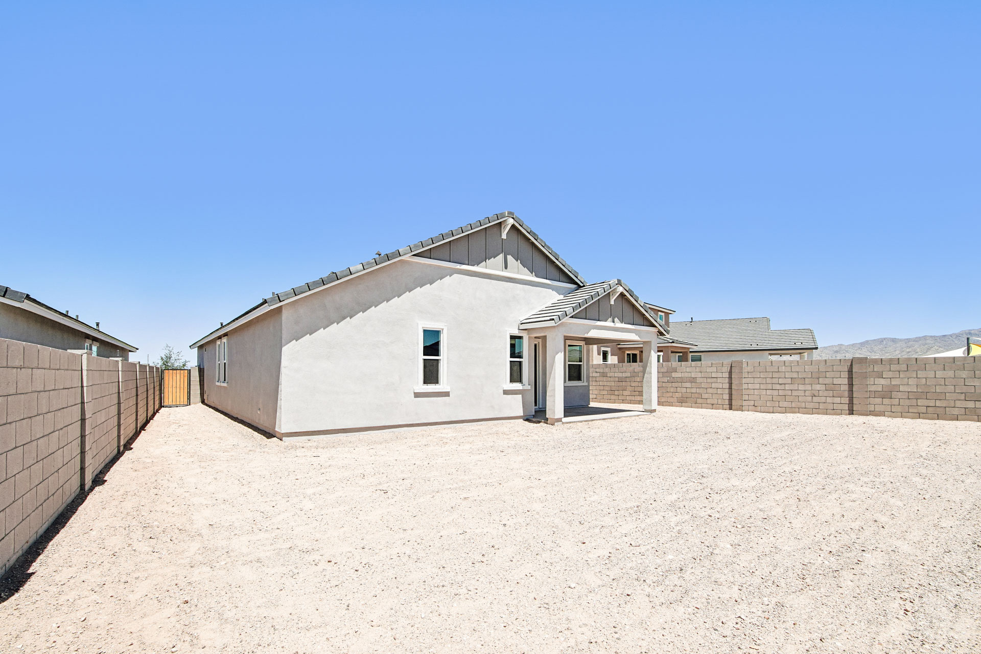 A building in a sandy area.