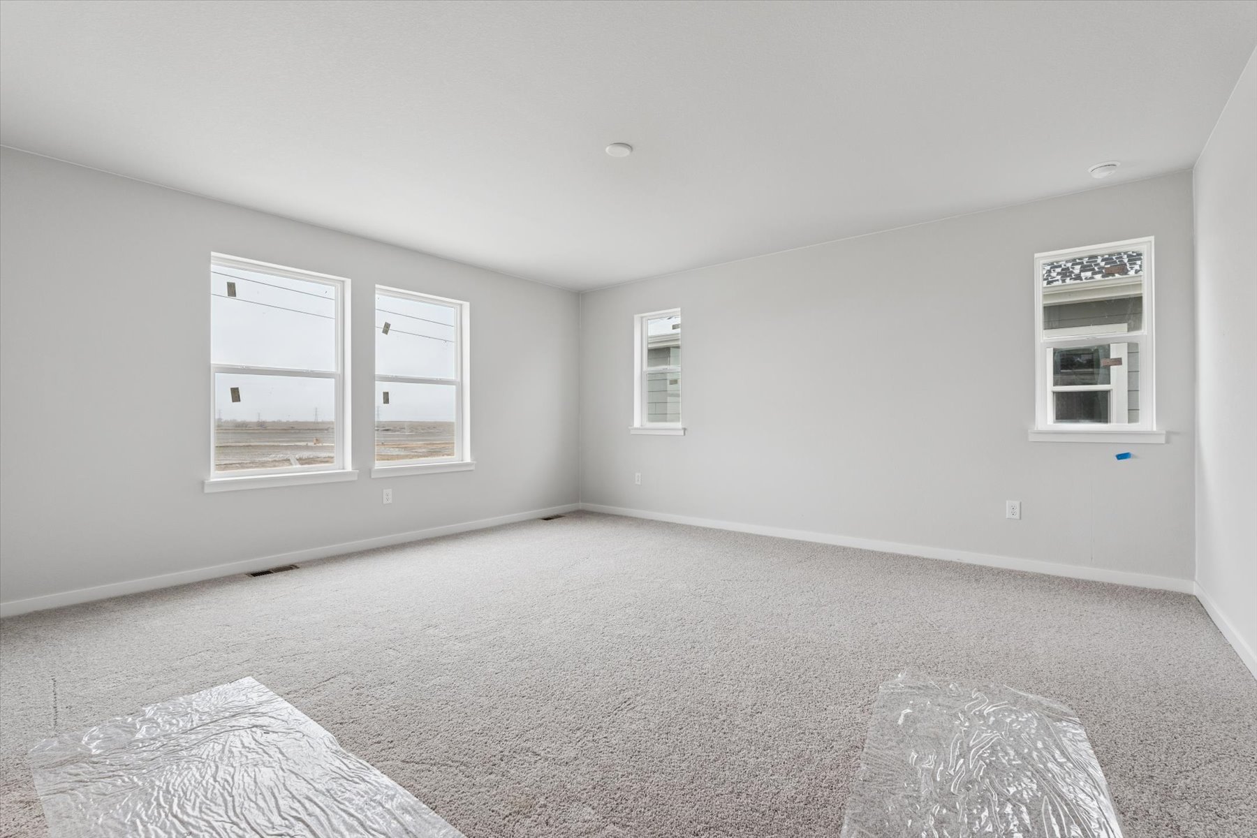 A room with a rug and a rug.