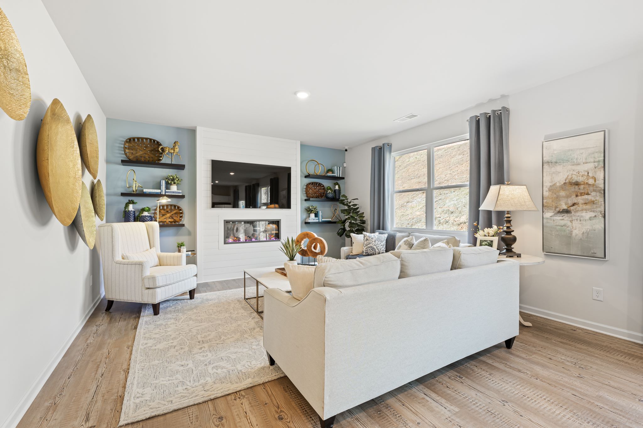 A living room with a white couch.