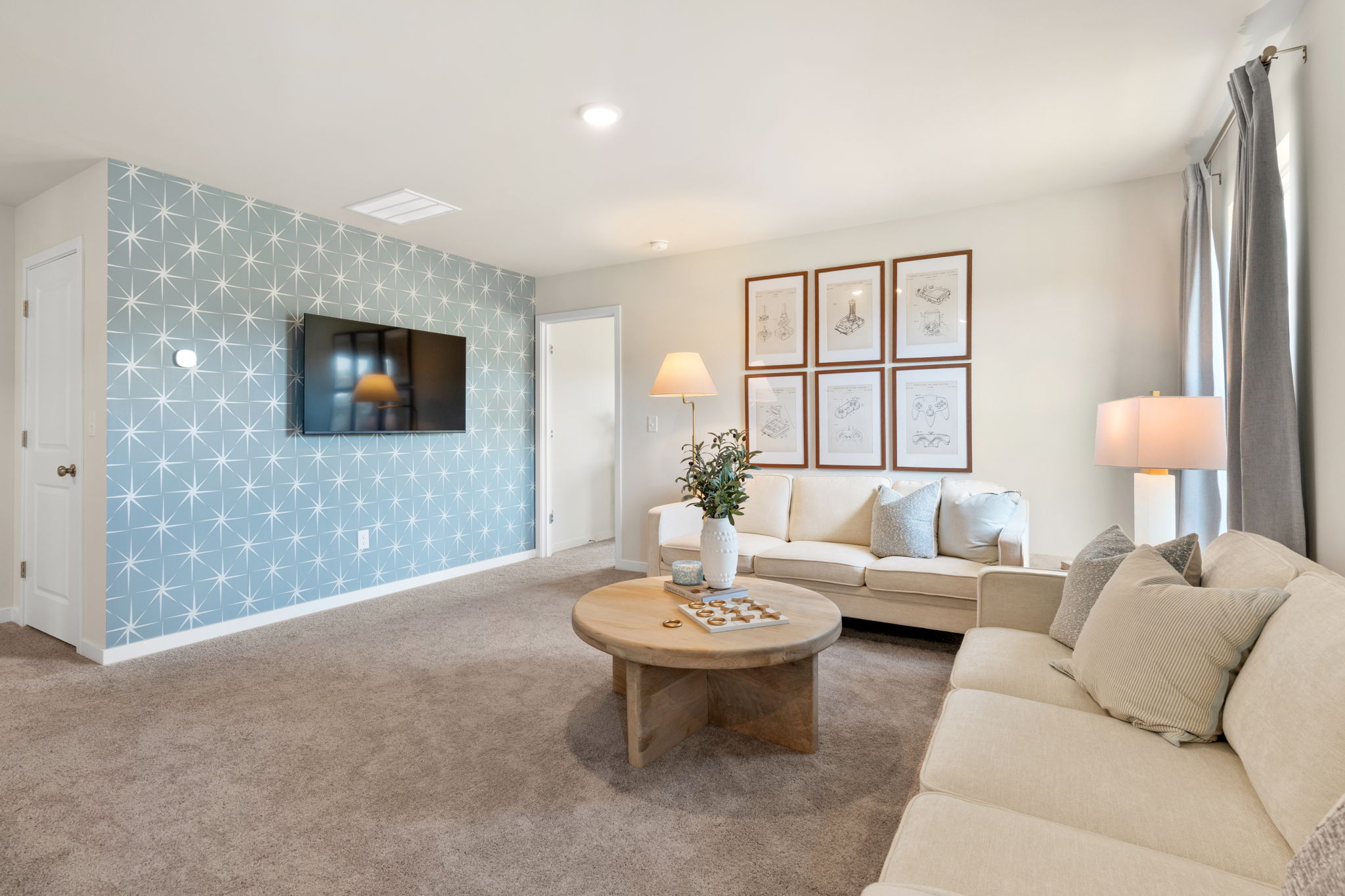 A living room with a couch and a coffee table.