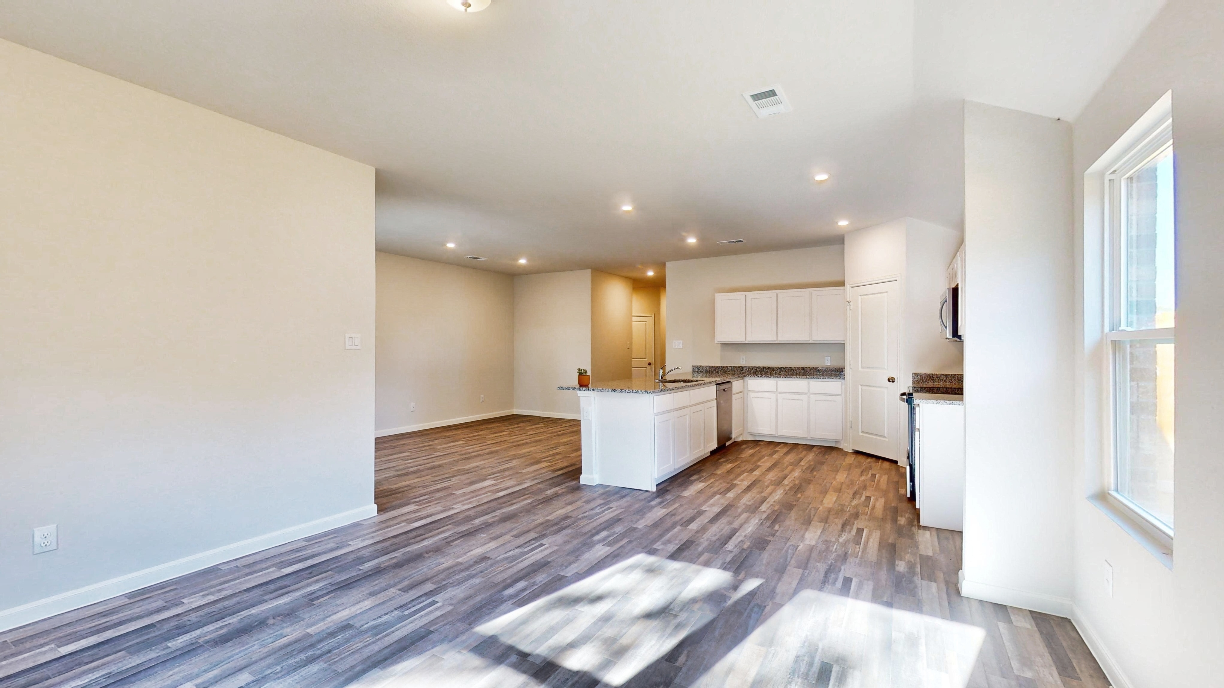 A large empty living room.