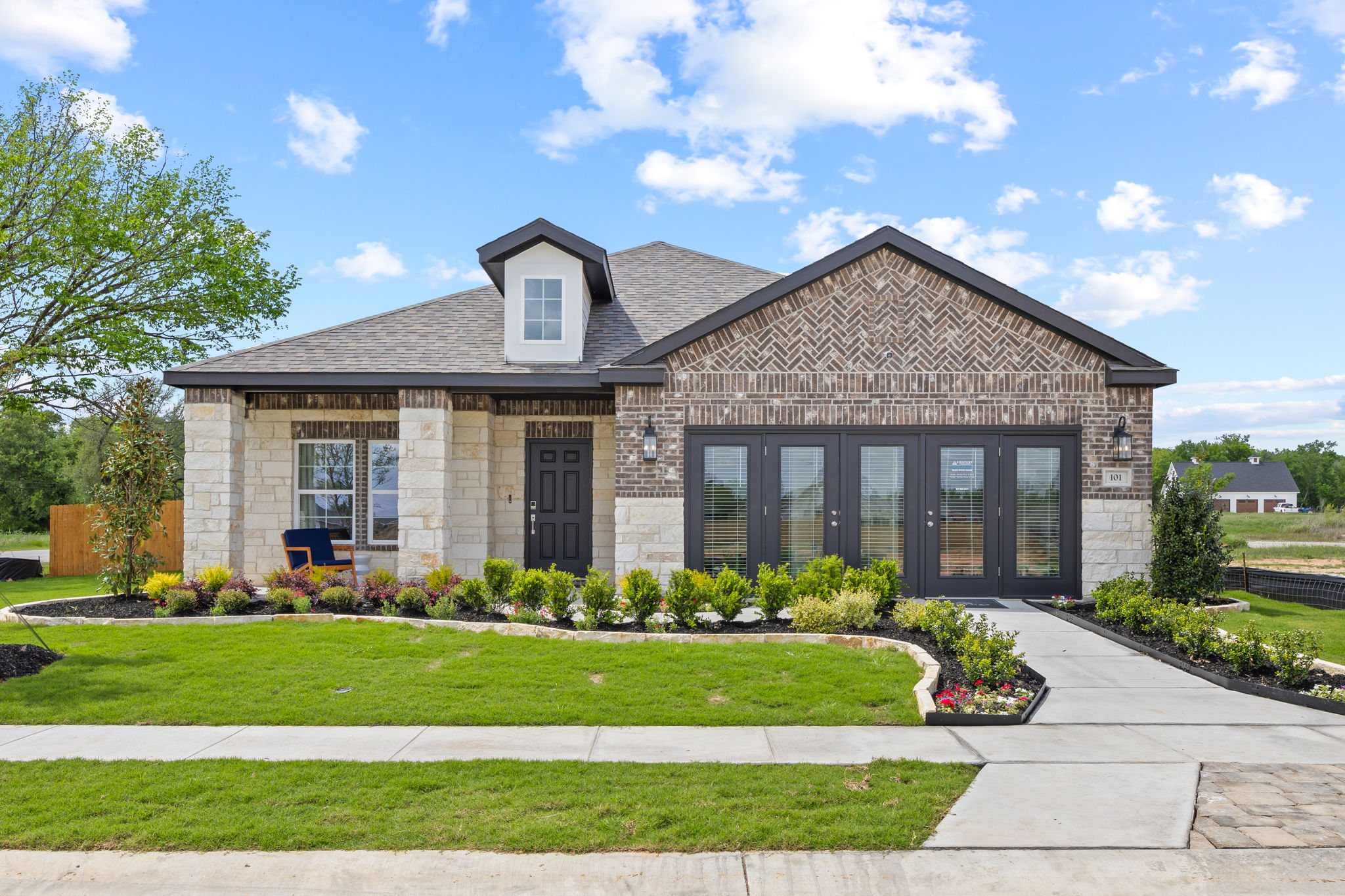 A house with a large front yard.
