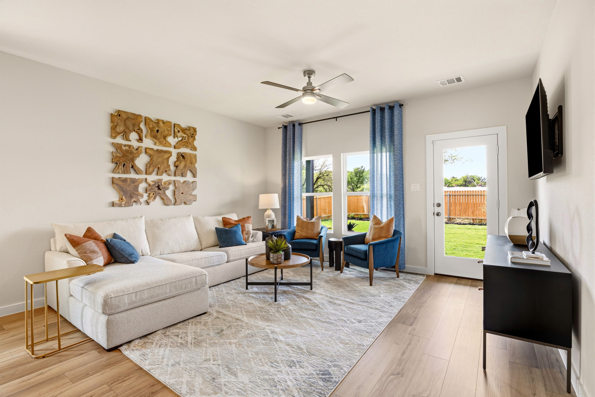 A living room with a large window.