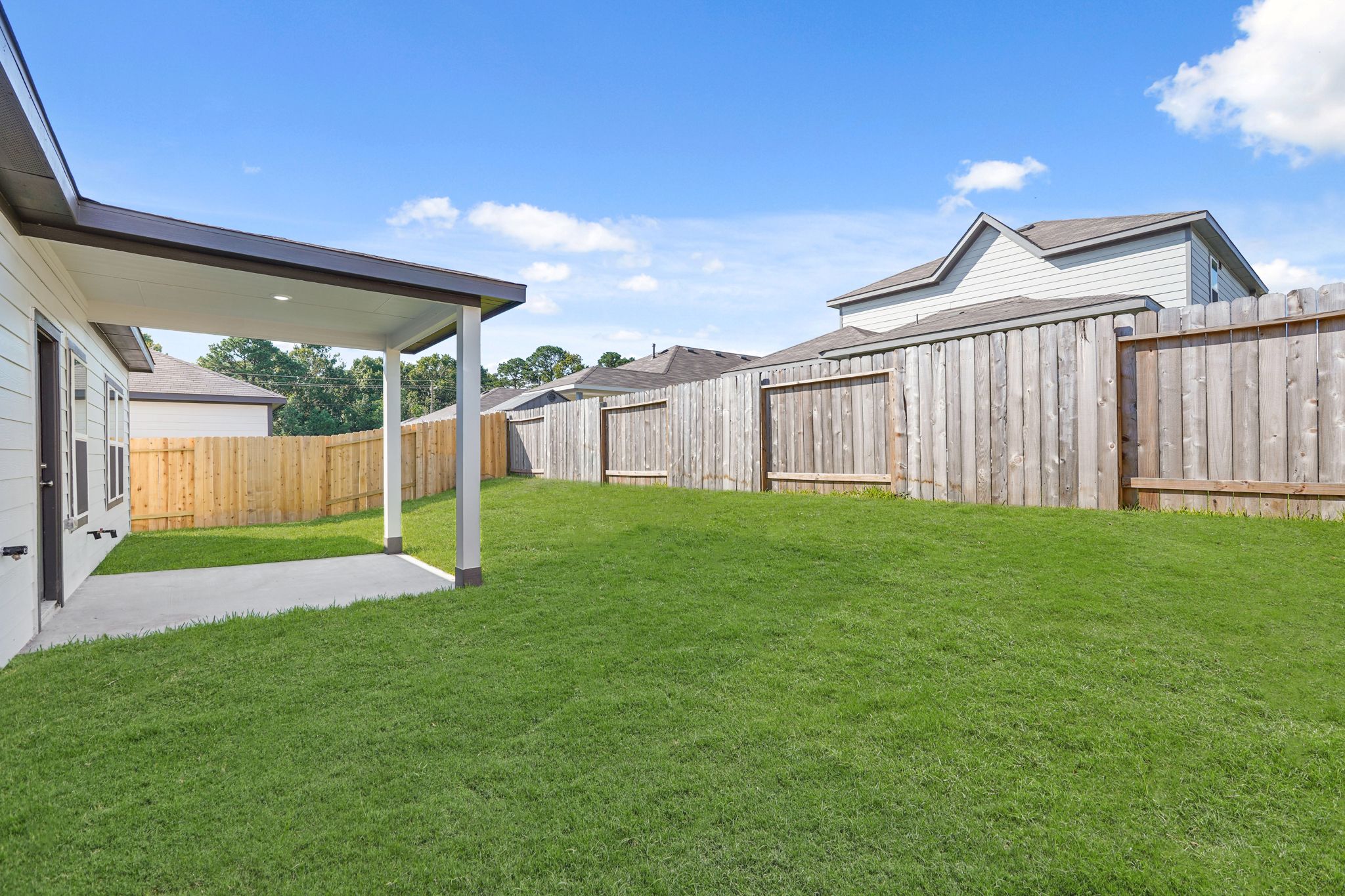 A row of wooden buildings.