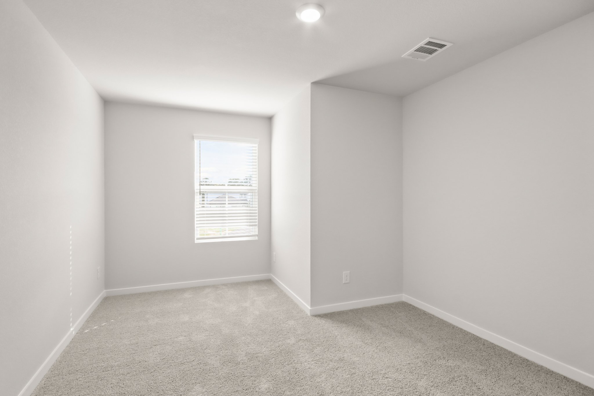 A room with a sign on the wall.