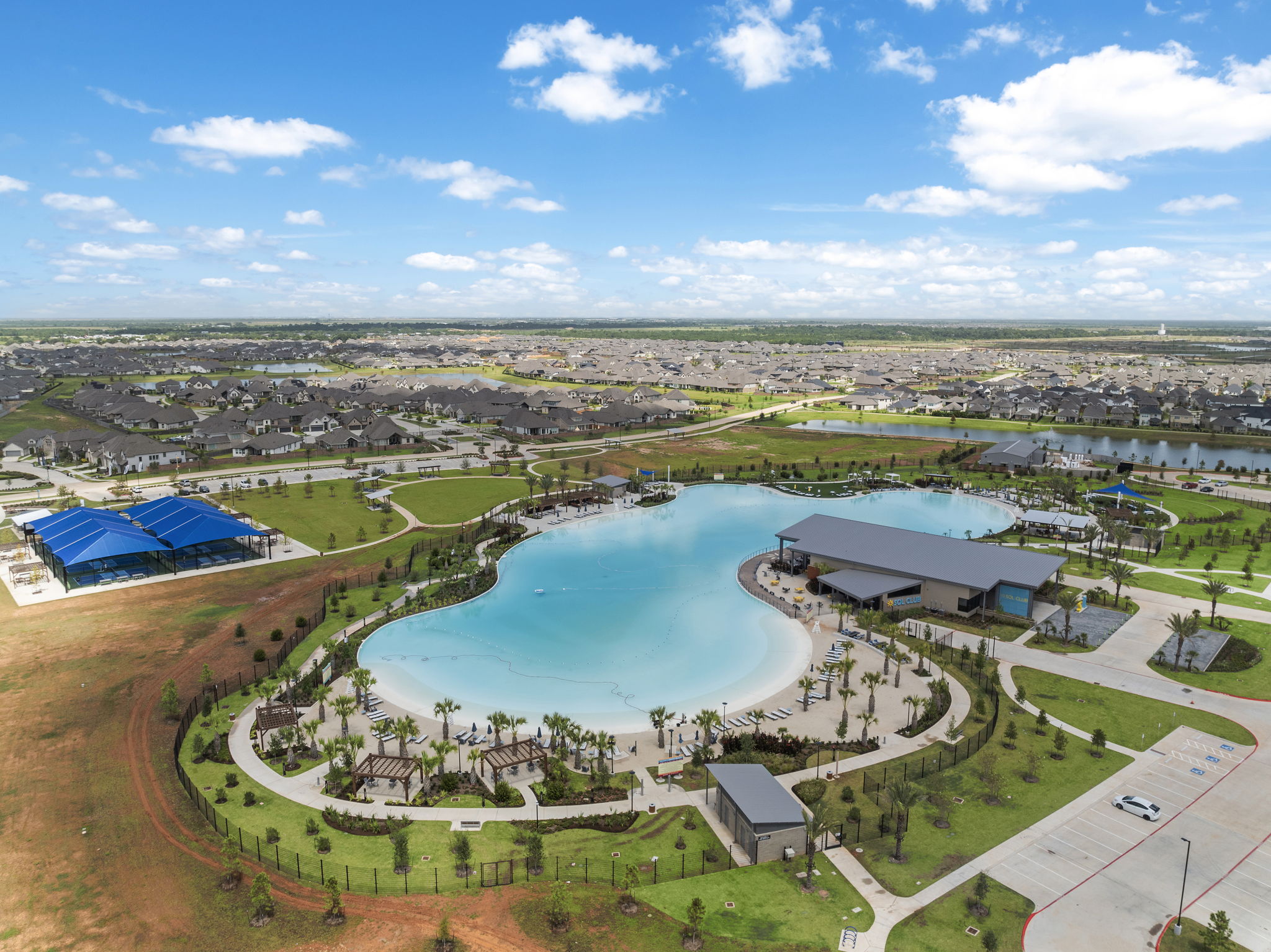 A river with a bridge and buildings.
