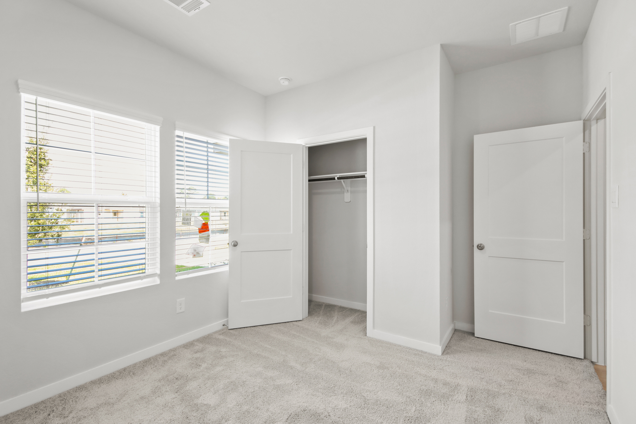 A room with white doors.