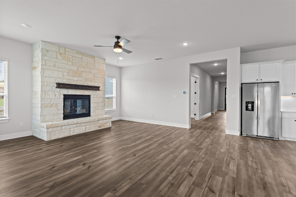 A large kitchen with a fireplace.