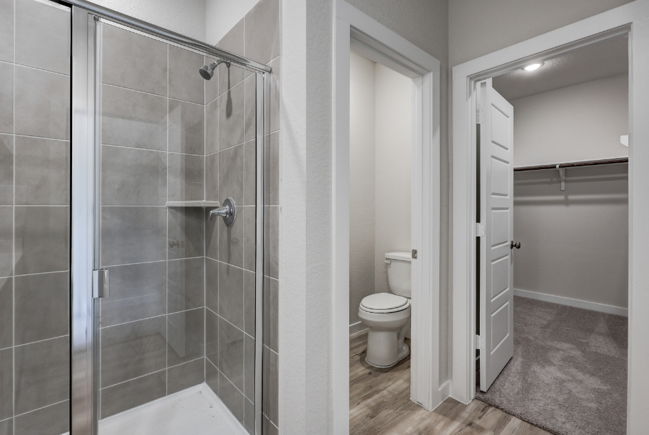 A bathroom with a glass shower.