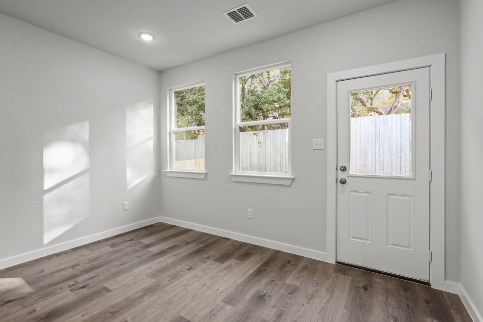 A room with white doors.