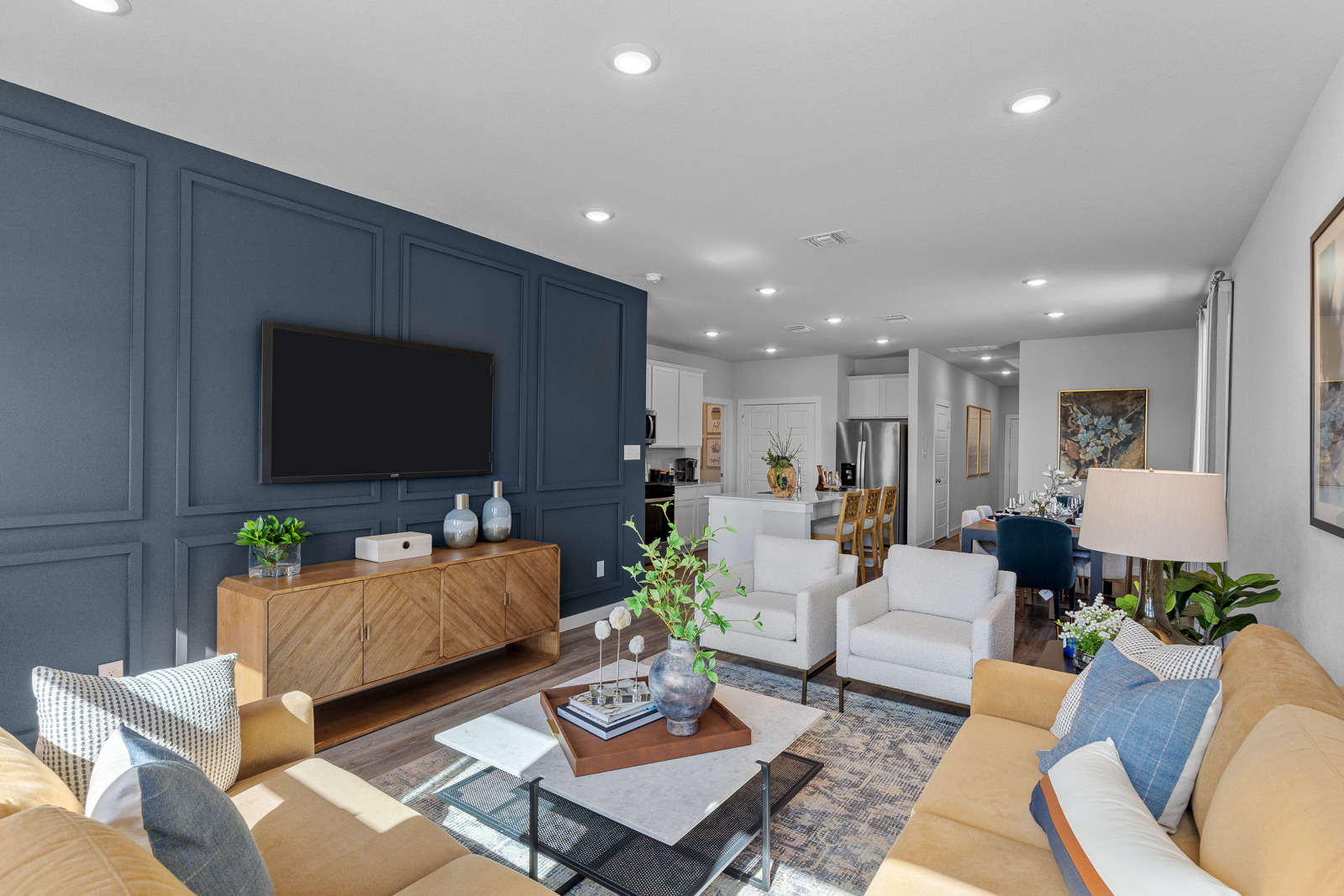 A living room with a tv and couches.