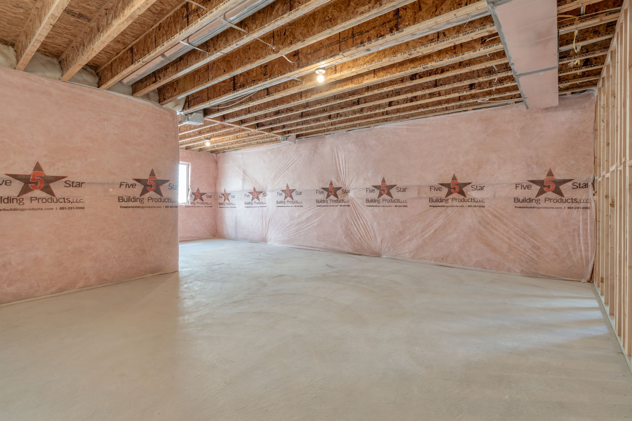 A room with a wall of signs.