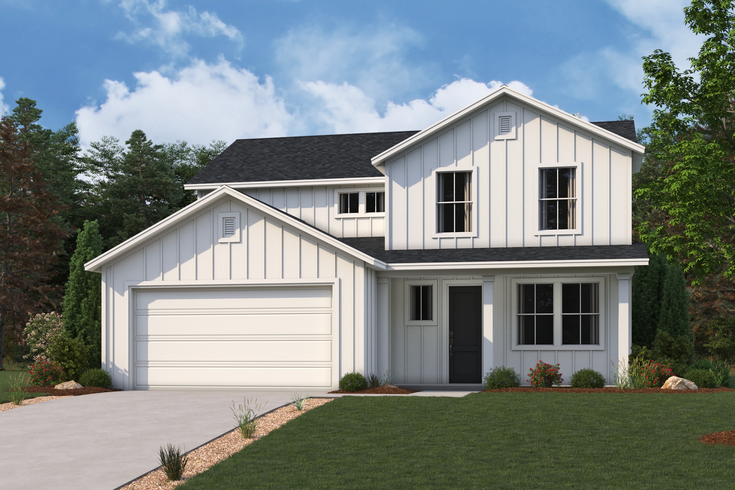 A white house with a green lawn.