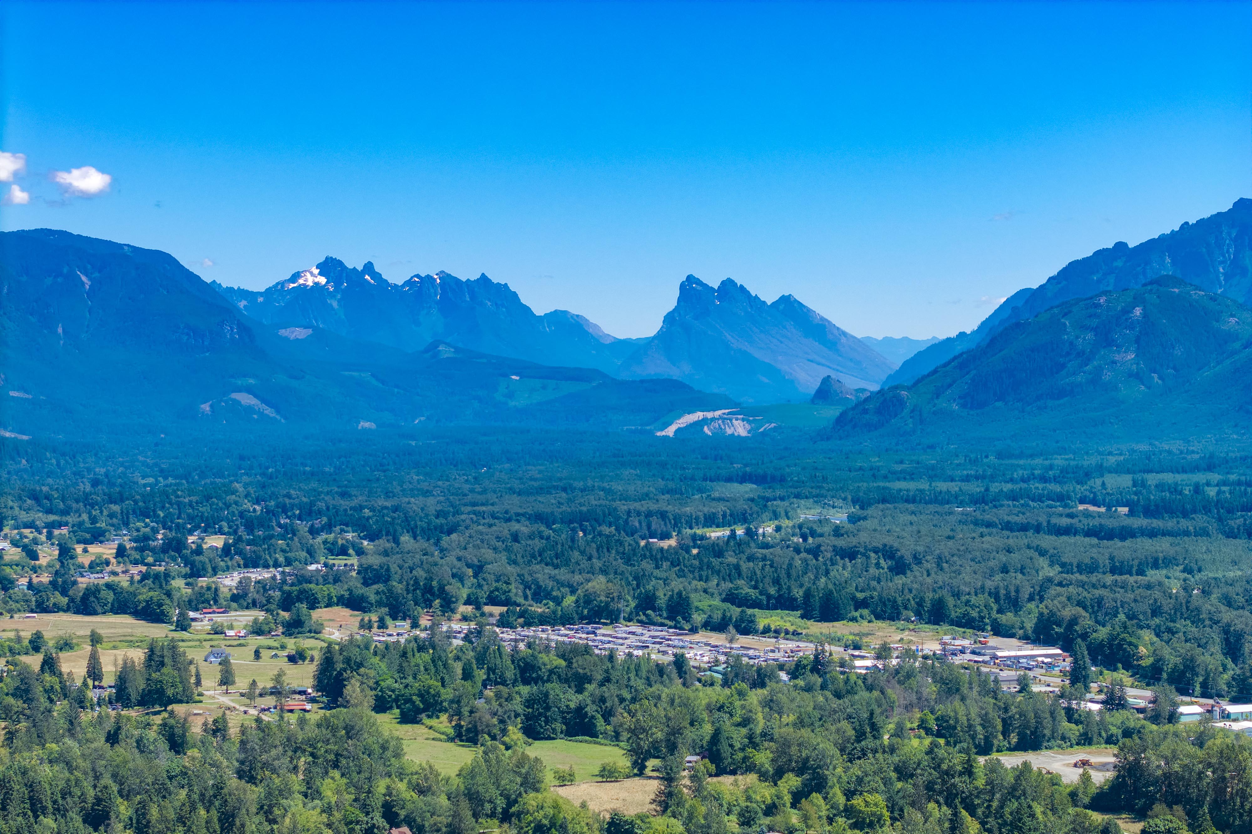 A town in the valley between mountains.