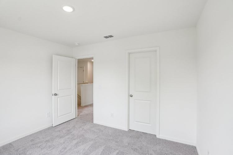A room with white doors.