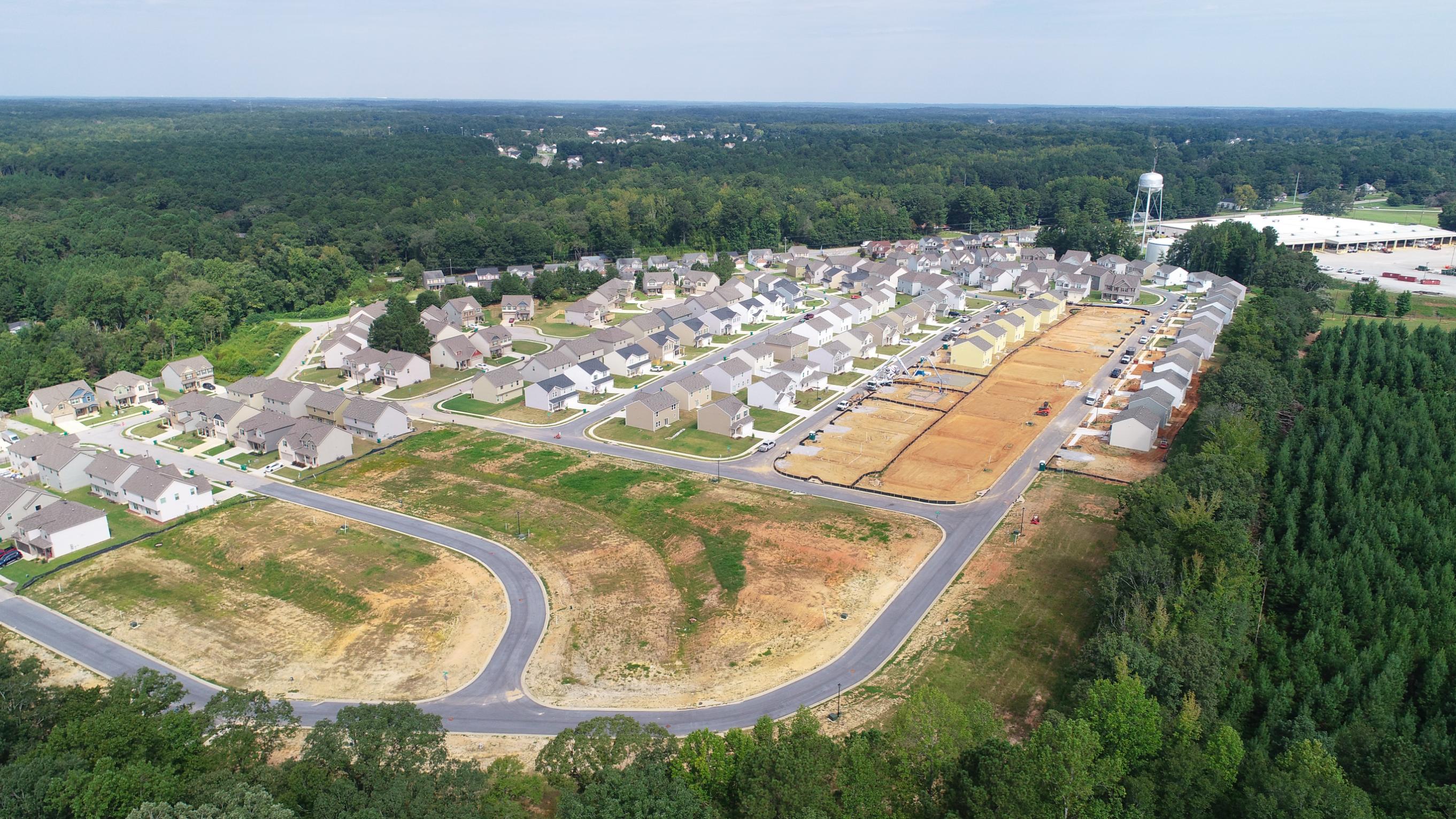 A large area with buildings and trees.